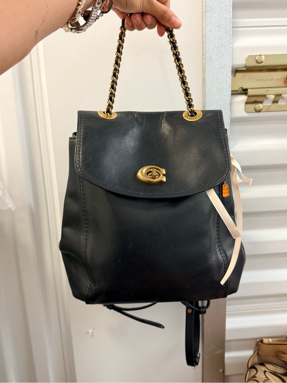 Coach Black Leather Backpack with Gold Chain Top Handle